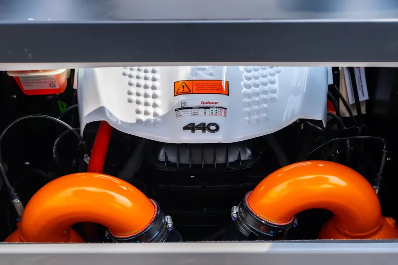 Slide: The Image of Engine of 2026 Tigé Z3 boat with vibrant orange components. - 31