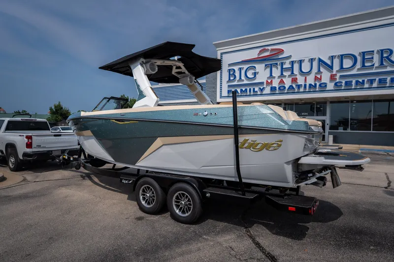Slide: The Image of 2026 Tigé Z3 boat on trailer at Big Thunder Marine dealership. - 18