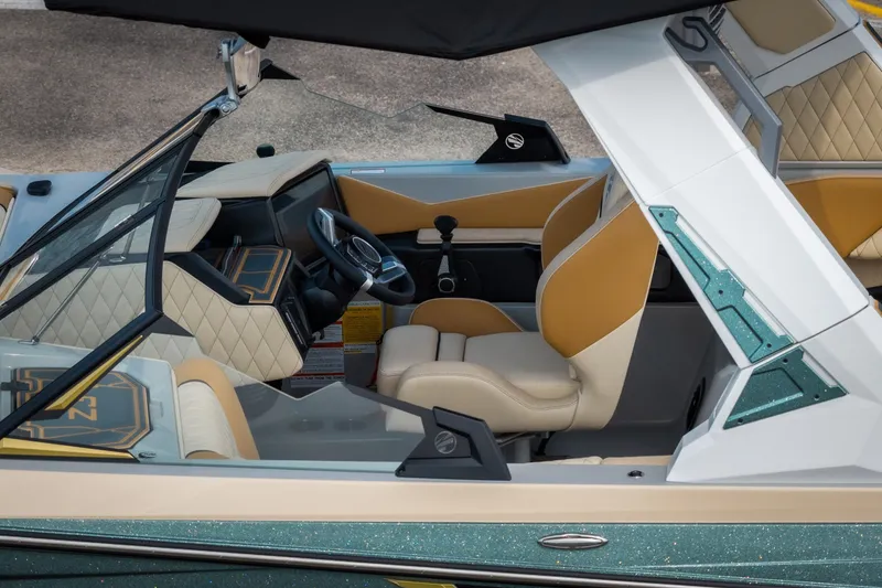 Slide: The Image of 2026 Tigé Z3 boat interior with luxurious tan and white seating, modern dashboard, and sleek design. - 4