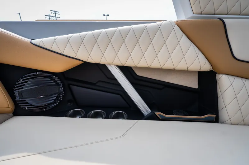 Slide: The Image of Luxurious interior of 2026 Tigé Z3 boat featuring quilted upholstery and integrated speaker system. - 54