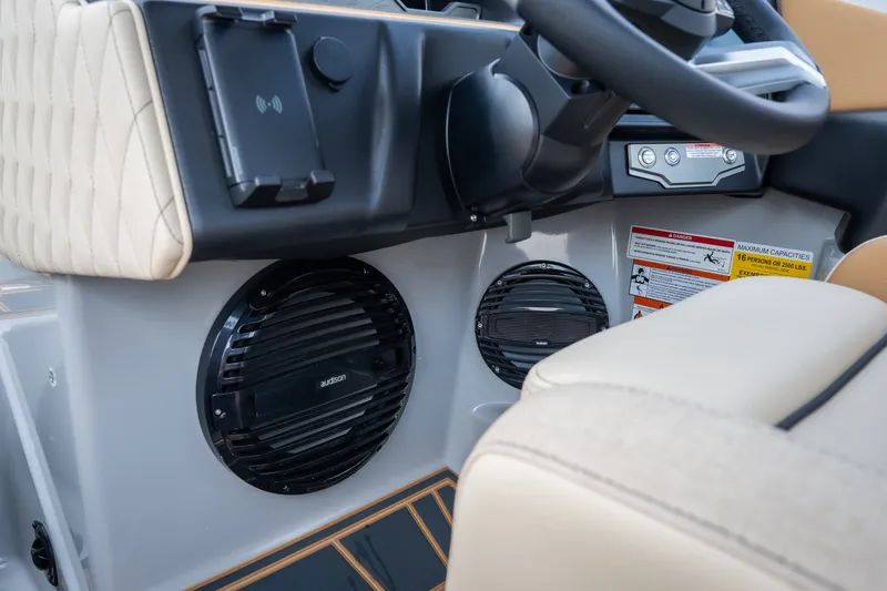 Slide: The Image of Interior of 2026 Tigé Z3 boat featuring steering wheel and audio system. - 44