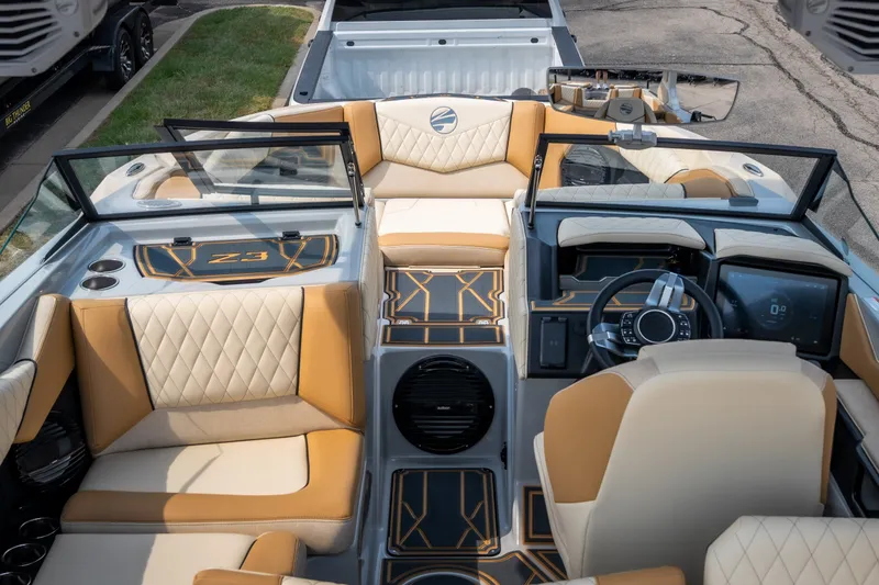 Slide: The Image of Interior of 2026 Tigé Z3 boat with luxurious seating and modern dashboard. - 67
