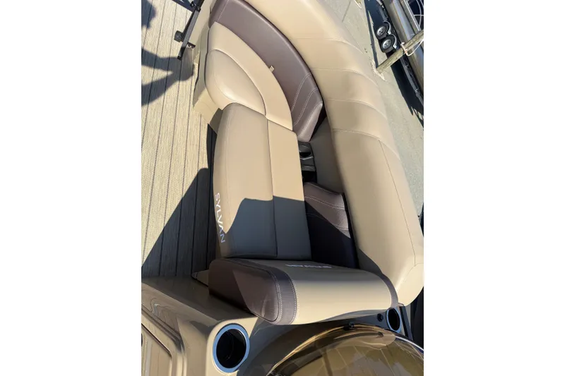 Slide: The Image of 2023 Sylvan Mirage X X1 boat seating with beige and brown upholstery. - 38