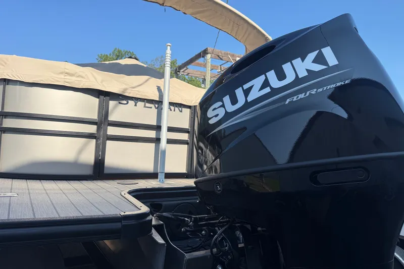 Slide: The Image of 2023 Sylvan Mirage X X1 pontoon boat with Suzuki four-stroke engine. - 8