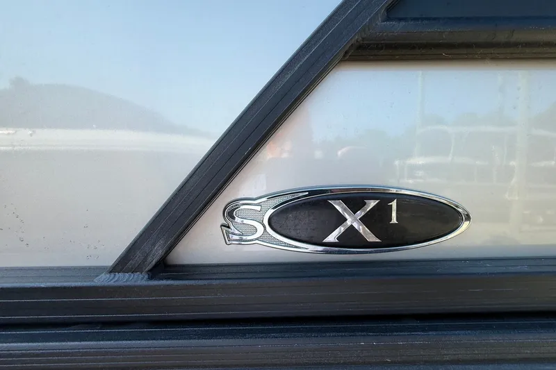 Slide: The Image of 2023 Sylvan Mirage X X1 emblem on a sleek, modern surface. - 3