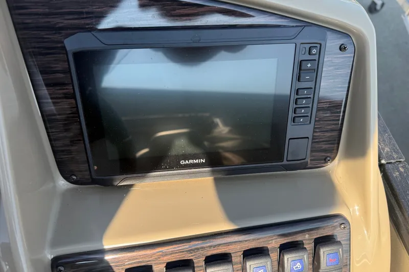 Slide: The Image of Dashboard of 2023 Sylvan Mirage X X1 with Garmin display and control panel. - 28