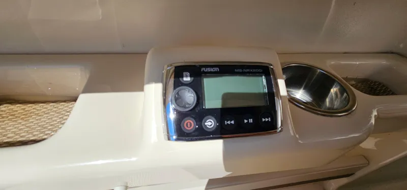 Slide: The Image of Fusion MS-NRX200i stereo on 2014 Grady-White Freedom 285 boat dashboard. - 11