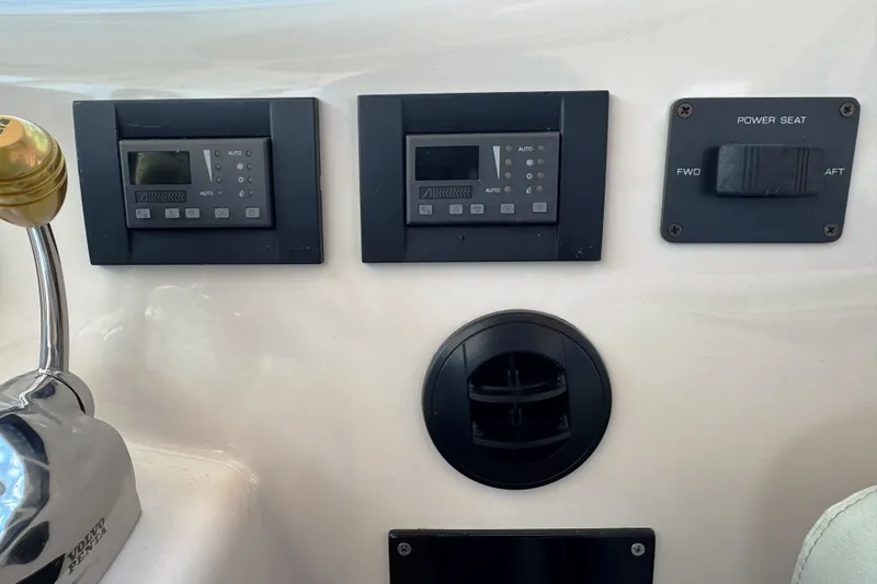 Slide: The Image of Control panel of a 2008 Tiara Yachts 4300 Sovran with power seat adjustment. - 20