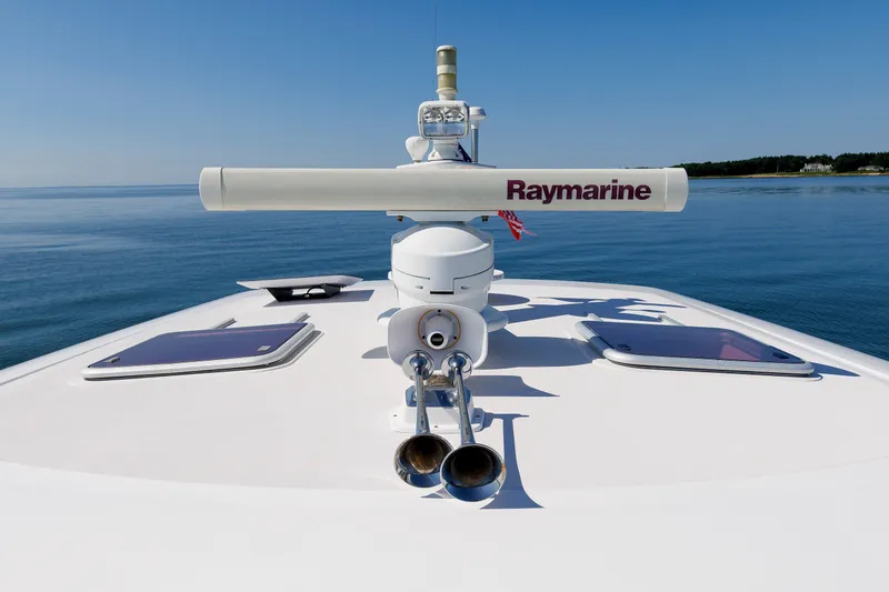 Slide: The Image of 2006 Sabre 42 Hard Top Express yacht with Raymarine radar on calm waters. - 51