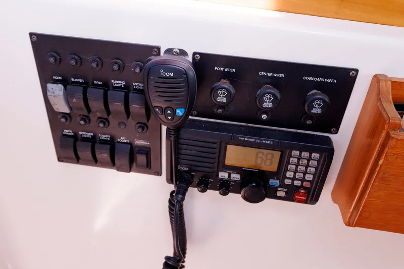 Slide: The Image of Control panel of a 2006 Sabre 42 Hard Top Express with radio and switches. - 30
