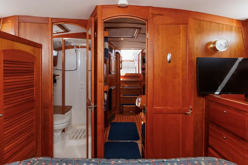 Slide: The Image of Interior of 2006 Sabre 42 Hard Top Express yacht with wood finish and modern amenities. - 42