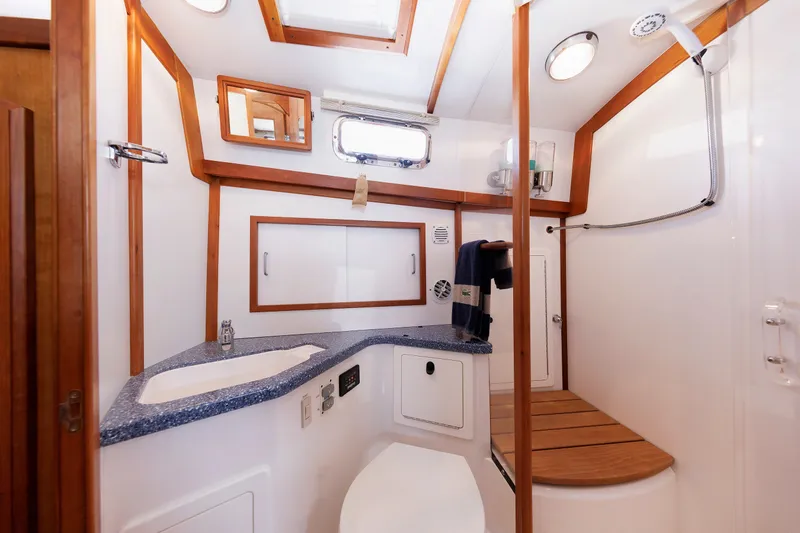 Slide: The Image of Luxurious bathroom interior of 2006 Sabre 42 Hard Top Express yacht. - 44