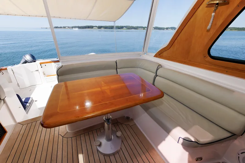 Slide: The Image of Luxurious seating area on a 2006 Sabre 42 Hard Top Express yacht with ocean view. - 20