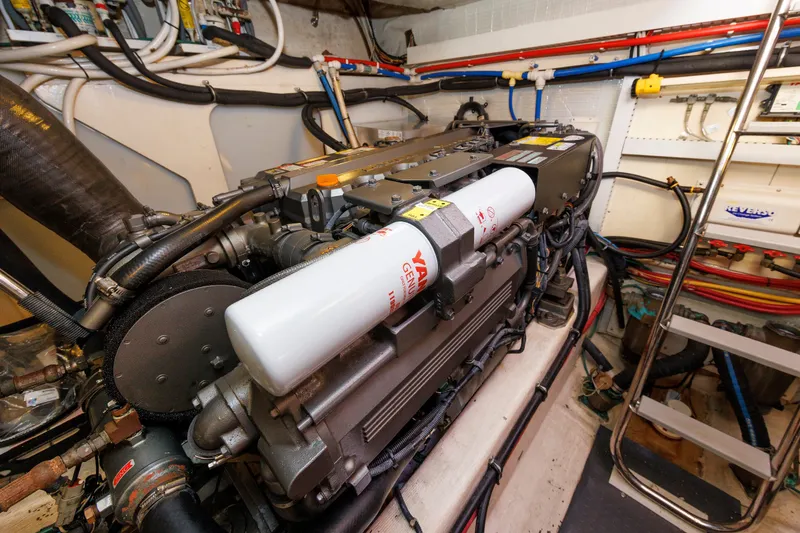 Slide: The Image of Engine room of 2006 Sabre 42 Hard Top Express with Yanmar generator. - 54