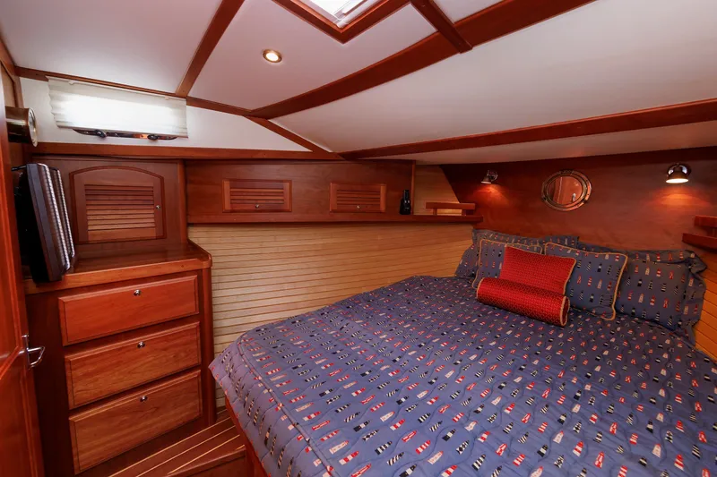 Slide: The Image of Luxurious cabin interior of 2006 Sabre 42 Hard Top Express yacht with wooden finishes. - 41