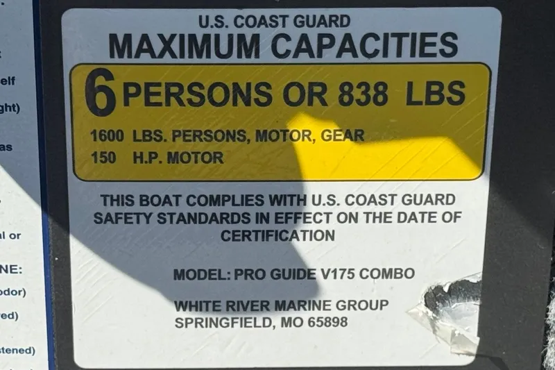 Slide: The Image of U.S. Coast Guard capacity label for 2022 Tracker Pro Guide V-175 Combo boat. - 35