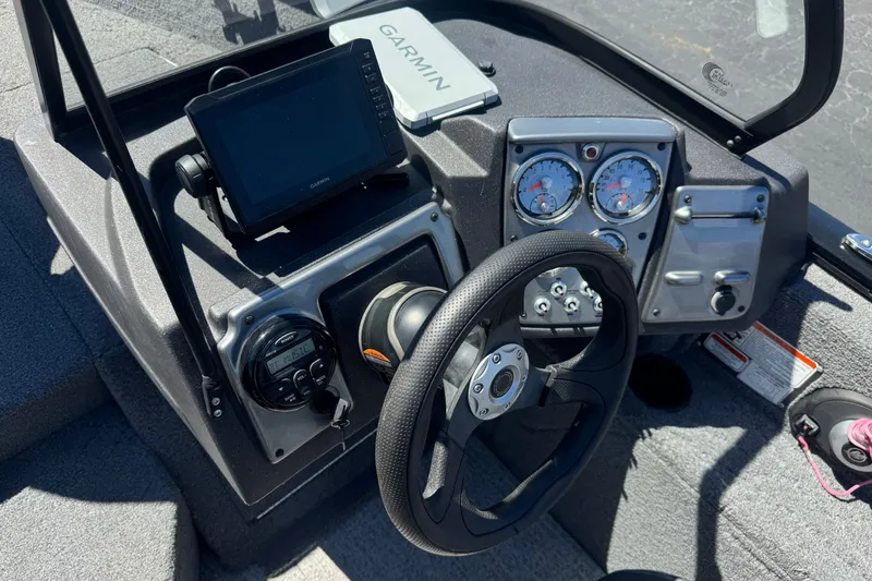 Slide: The Image of Dashboard of 2022 Tracker Pro Guide V-175 Combo boat with Garmin navigation system. - 32