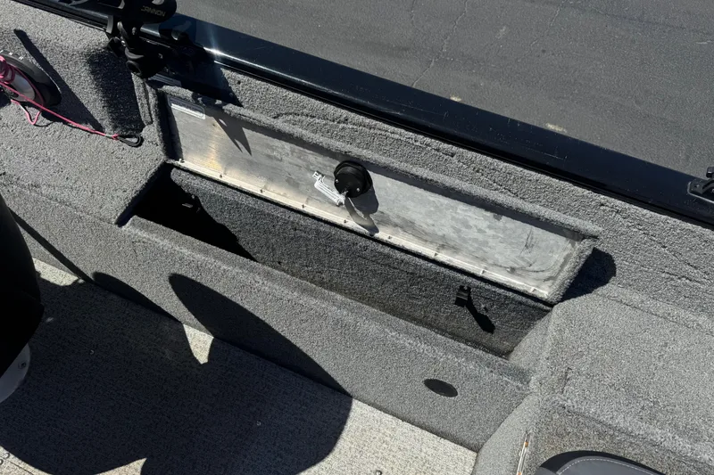 Slide: The Image of 2022 Tracker Pro Guide V-175 Combo boat interior storage compartment. - 24