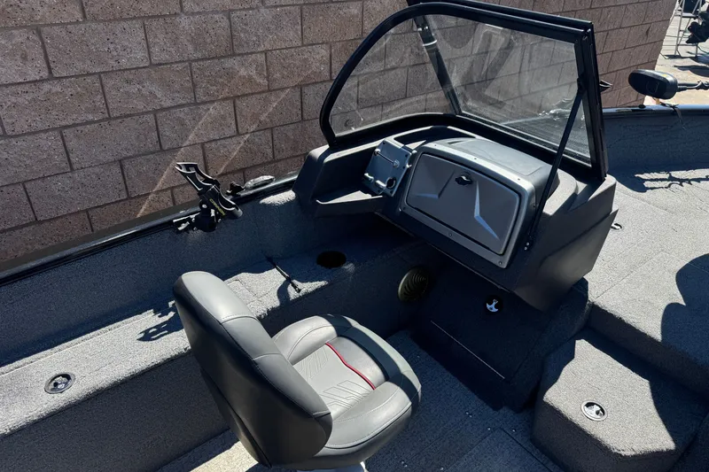 Slide: The Image of 2022 Tracker Pro Guide V-175 Combo boat interior with steering console and seating. - 27