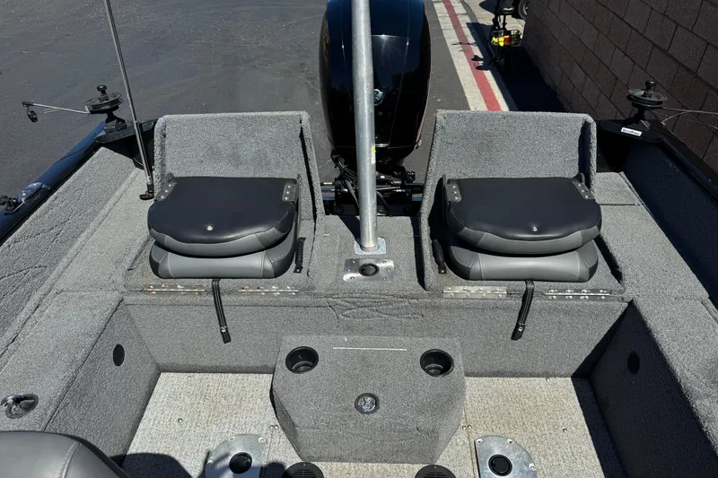 Slide: The Image of 2022 Tracker Pro Guide V-175 Combo boat interior with two cushioned seats. - 18