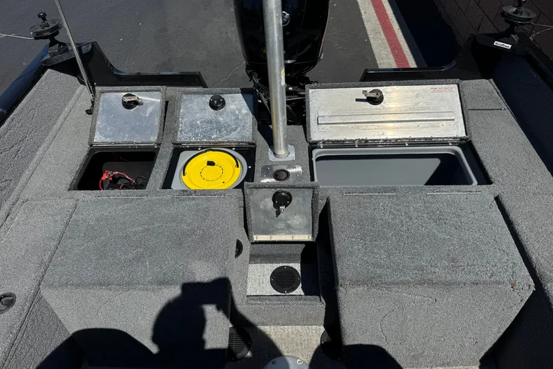 Slide: The Image of 2022 Tracker Pro Guide V-175 Combo boat interior with storage compartments and equipment. - 20