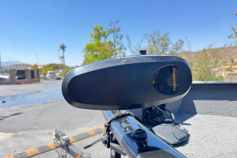 Slide: The Image of 2022 Tracker Pro Guide V-175 Combo boat with PowerDrive motor in sunny outdoor setting. - 12