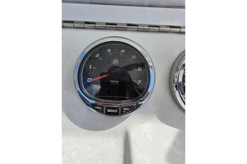 Slide: The Image of Close-up of a 2023 SeaVee 340B boat tachometer displaying RPM. - 11