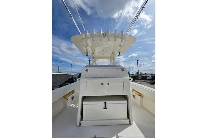 Slide: The Image of 2023 SeaVee 340B boat console under a clear blue sky. - 5