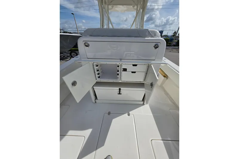 Slide: The Image of 2023 SeaVee 340B boat storage compartments with open doors, showcasing interior space. - 6