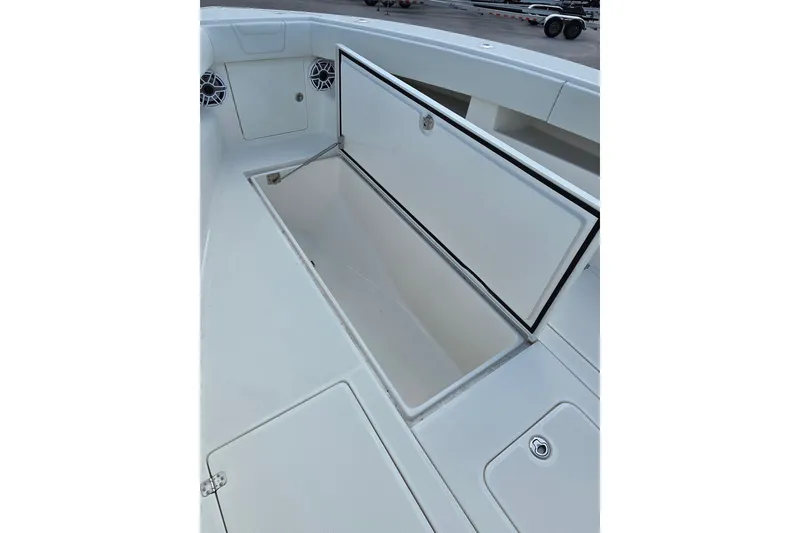 Slide: The Image of Open storage compartment on 2023 SeaVee 340B boat deck. - 21
