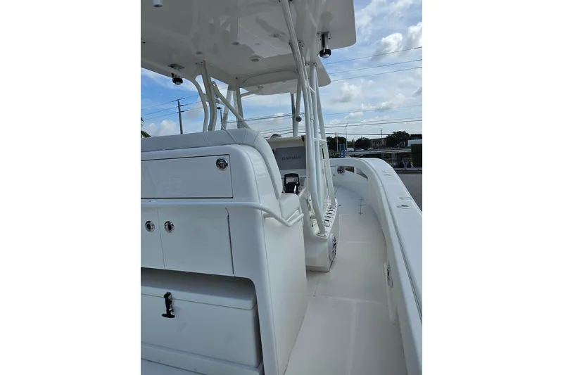 Slide: The Image of 2023 SeaVee 340B boat interior with sleek white design and modern equipment. - 20