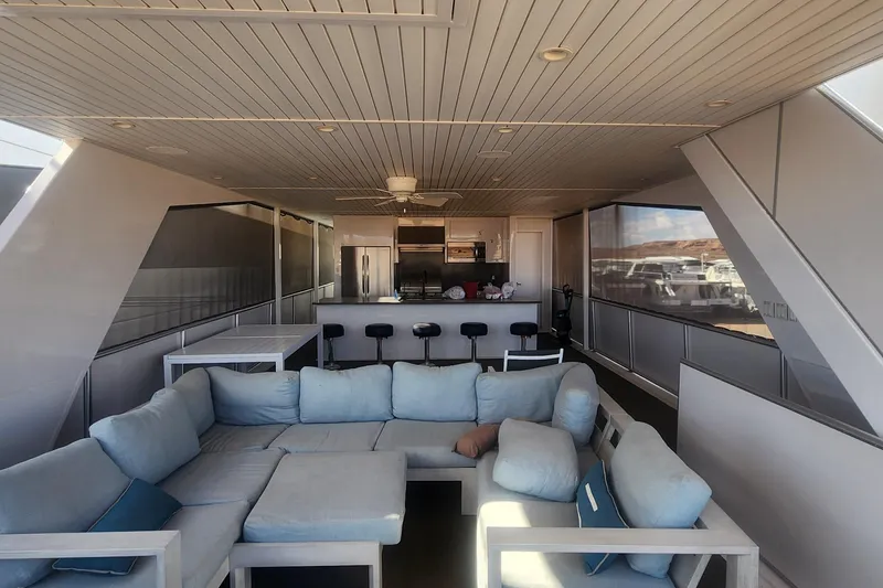 Slide: The Image of Luxurious yacht interior with modern kitchen and cozy seating, Adonia Legacy Trip 2022. - 17