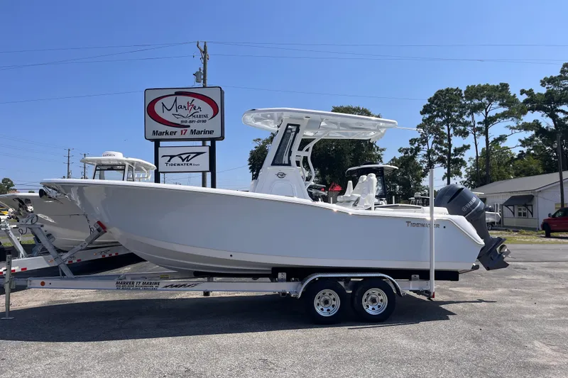 The Image of 2027 Tidewater 232 LXF boat on trailer at Marker 17 Marine dealership. - 0