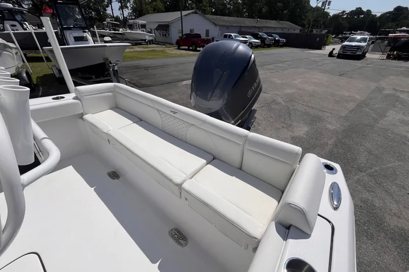 Slide: The Image of 2027 Tidewater 232 LXF boat with white seating and Yamaha outboard motor. - 6