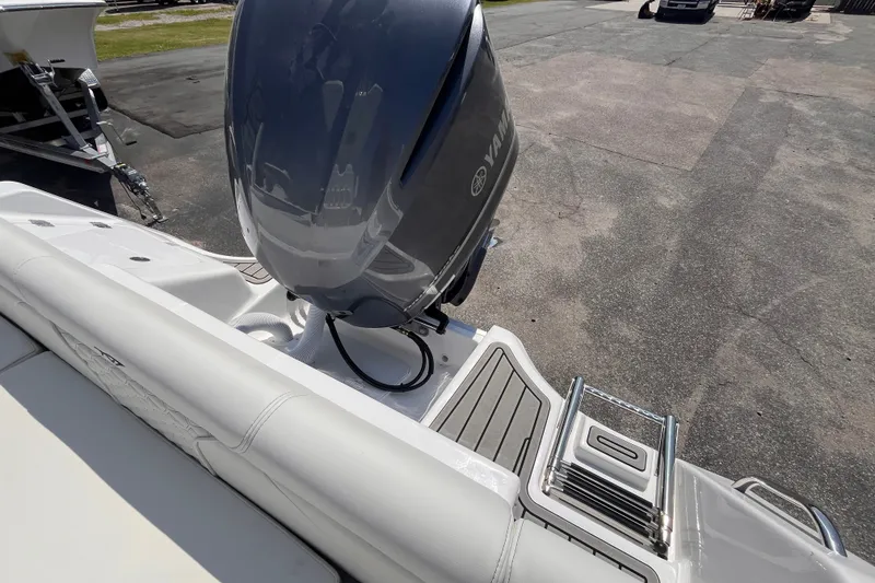 Slide: The Image of 2027 Tidewater 232 LXF boat with Yamaha outboard motor and swim platform. - 5