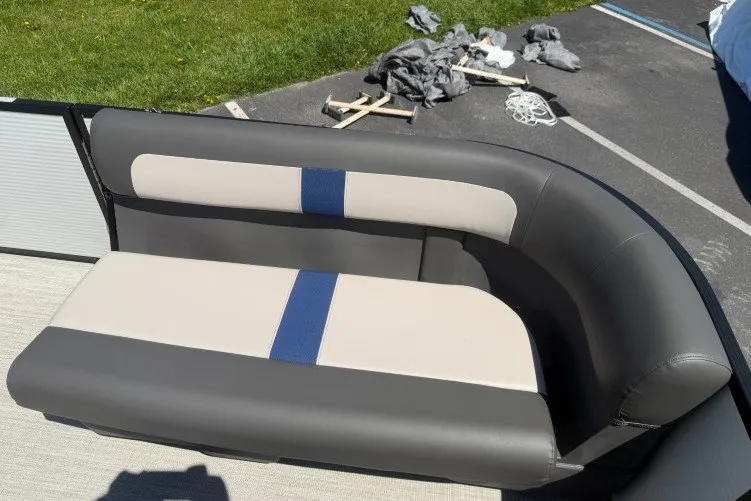 Slide: The Image of 2026 Princecraft Jazz 170 boat seat with gray and blue upholstery. - 14