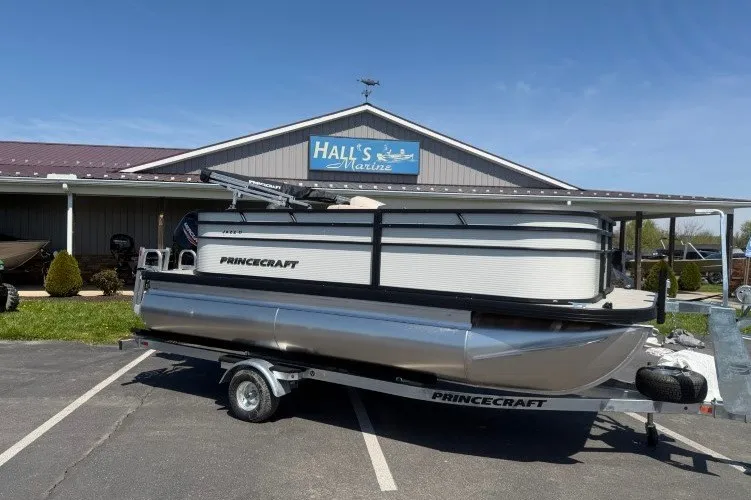 The Image of 2026 Princecraft Jazz 170 pontoon boat on trailer at Hall's Marine dealership. - 1