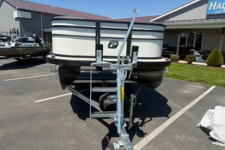 Slide: The Image of 2026 Princecraft Jazz 170 pontoon boat on trailer in parking lot. - 3