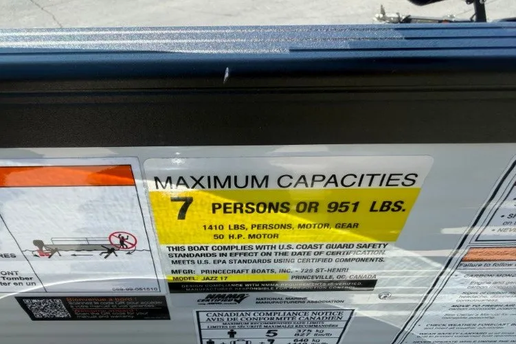 Slide: The Image of Maximum capacity label on 2026 Princecraft Jazz 170 boat, 7 persons or 951 lbs. - 8