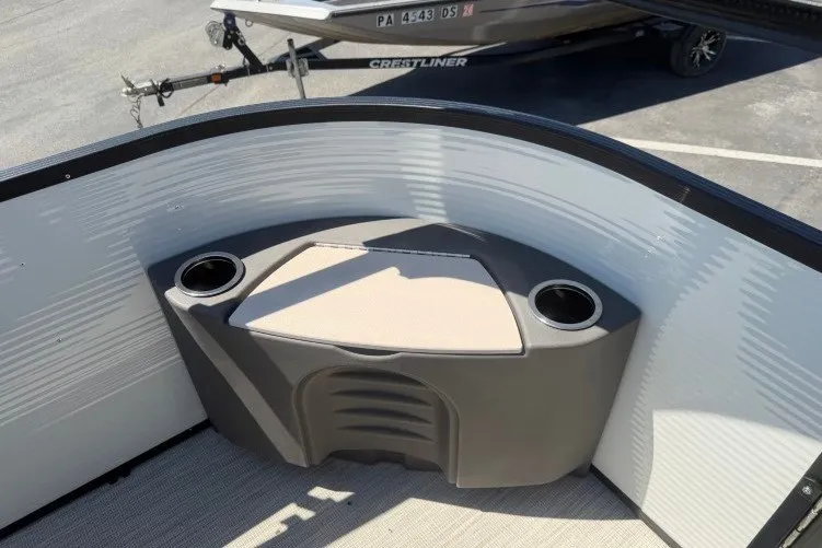 Slide: The Image of 2026 Princecraft Jazz 170 boat interior with cup holders and seating area. - 7