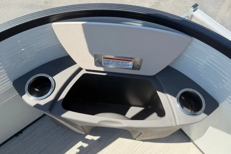 Slide: The Image of 2026 Princecraft Jazz 170 boat console with cup holders and storage compartment. - 18