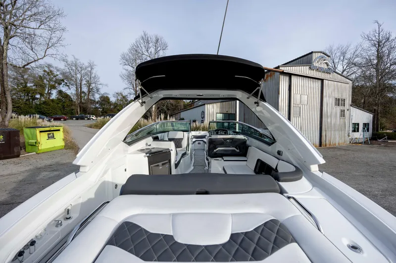 Slide: The Image of 2015 Monterey 328SS Super Sport boat interior with sleek seating and modern design. - 8