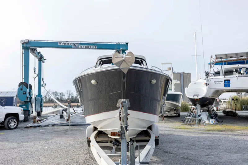 Slide: The Image of 2015 Monterey 328SS Super Sport boat on trailer at marina. - 3