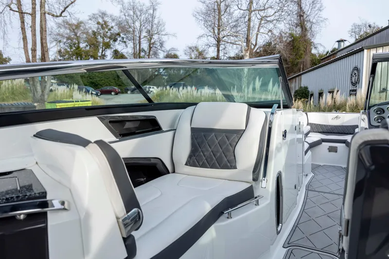 Slide: The Image of 2015 Monterey 328SS Super Sport boat interior with luxurious seating and modern design. - 17