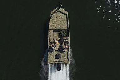 Slide: The Image of Manufacturer Provided Image: Aerial view of 2026 Crestliner 2070 Retriever SCHD boat cruising on water. - 16