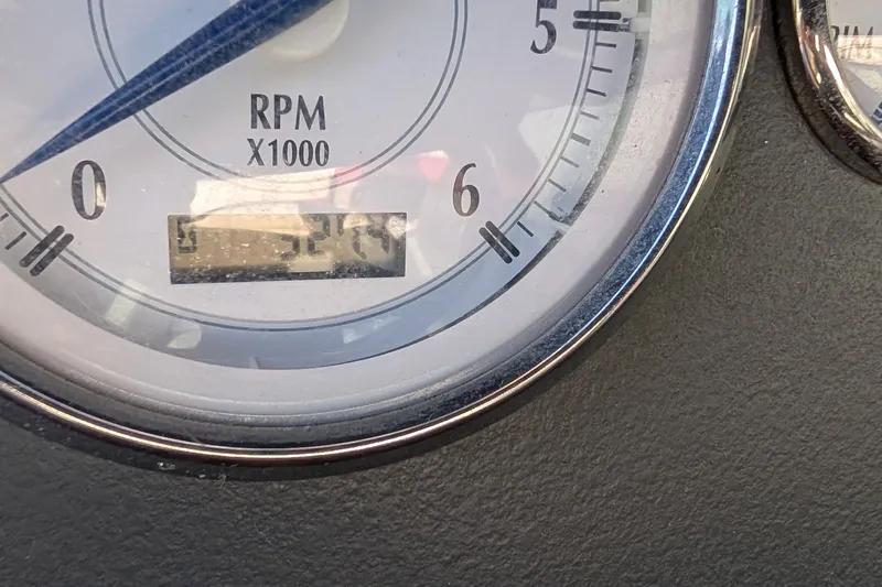 Slide: The Image of Close-up of 2006 Four Winns 210 Horizon RPM gauge displaying engine speed. - 12