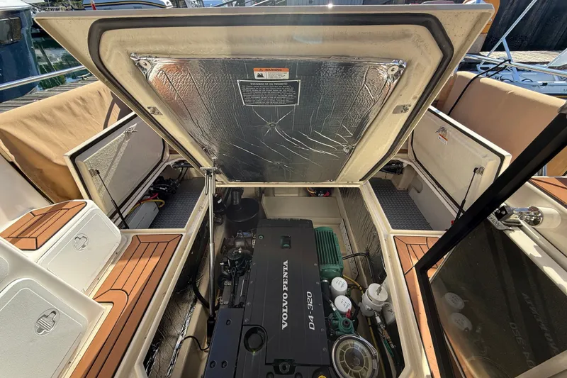 Slide: The Image of Engine compartment of 2023 Ranger Tugs R-29 S with Volvo Penta D4-320 engine. - 9