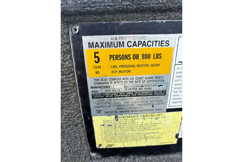 Slide: The Image of 1998 Alumacraft boat capacity label, maximum 5 persons or 800 lbs, 80 HP motor. - 4