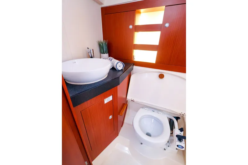 Slide: The Image of Bathroom interior of 2016 Hanse 385 yacht with modern sink and toilet. - 51