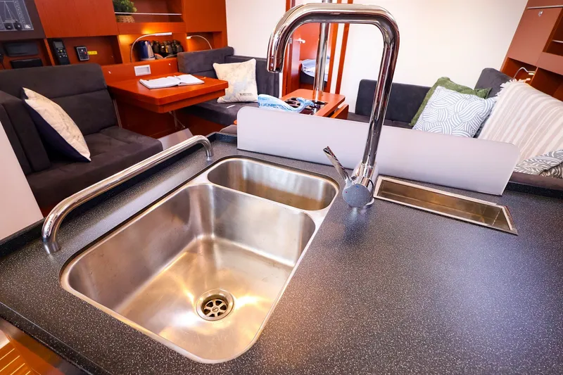 Slide: The Image of Modern kitchen interior of 2016 Hanse 385 yacht with stainless steel sink and cozy seating. - 32